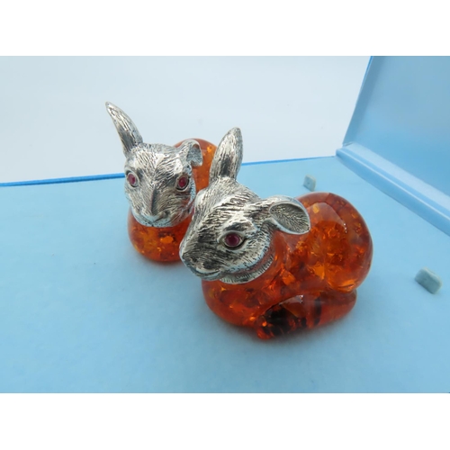 863 - Pair of Solid Silver Mounted Amber Set Rabbit Figures