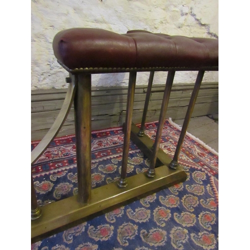 872 - Burgundy Deep Button Leather Upholstered Brass Rail Club Fender Approximately 5ft 6 Inches Wide