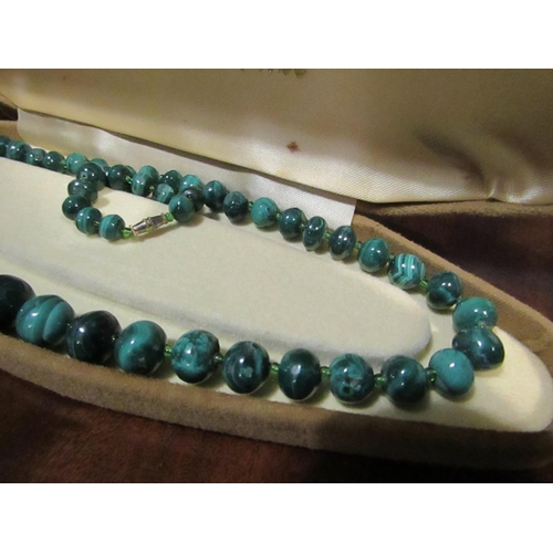 875 - Malachite Bead Necklace of Graduated Form Approximately 67cm Long