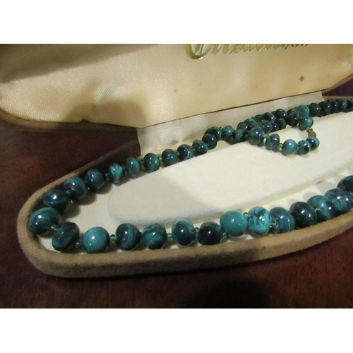 875 - Malachite Bead Necklace of Graduated Form Approximately 67cm Long