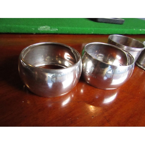 896 - Four Solid Silver Napkin Rings