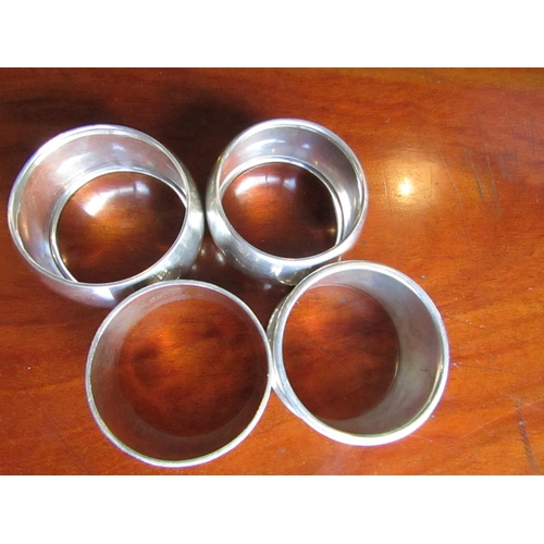 896 - Four Solid Silver Napkin Rings