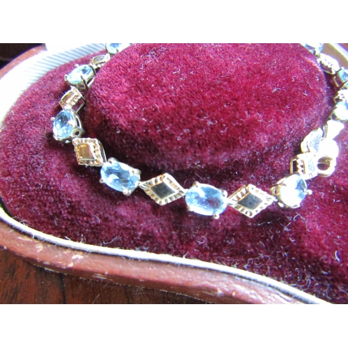 937 - 9 Carat Gold Mounted Blue Topaz Ladies Line Bracelet