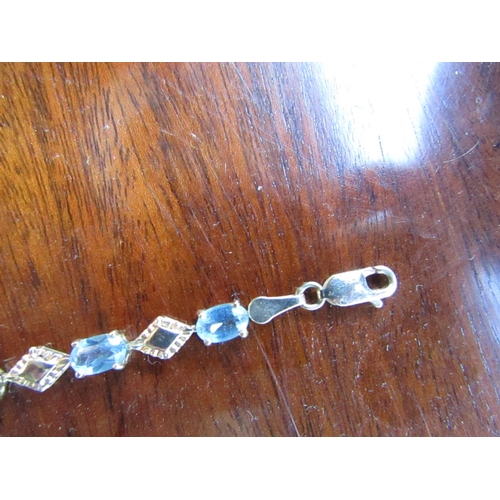 937 - 9 Carat Gold Mounted Blue Topaz Ladies Line Bracelet