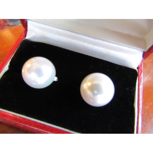 94 - Pair of Large Pearl Earrings of Attractive Size and Lustre