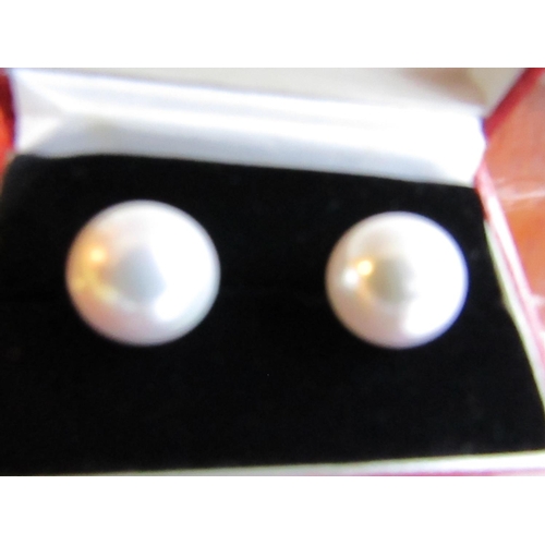 94 - Pair of Large Pearl Earrings of Attractive Size and Lustre