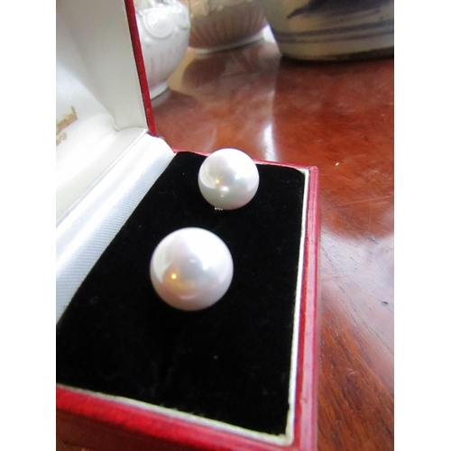 94 - Pair of Large Pearl Earrings of Attractive Size and Lustre