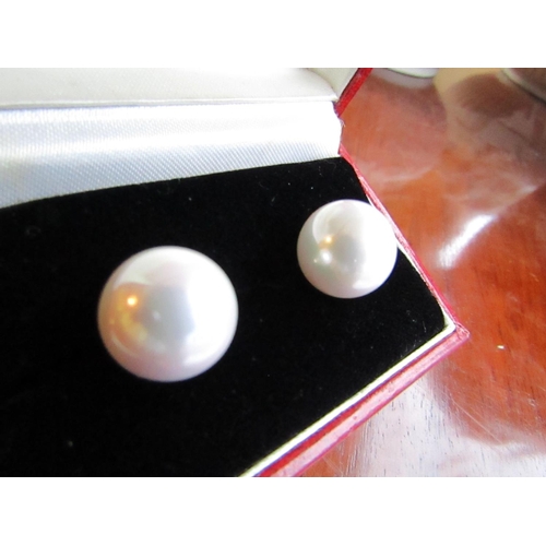 94 - Pair of Large Pearl Earrings of Attractive Size and Lustre