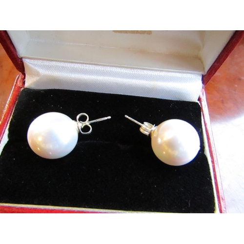 94 - Pair of Large Pearl Earrings of Attractive Size and Lustre