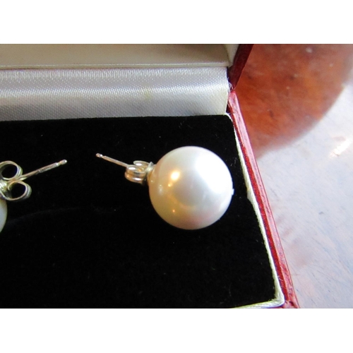 94 - Pair of Large Pearl Earrings of Attractive Size and Lustre