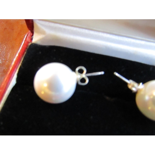 94 - Pair of Large Pearl Earrings of Attractive Size and Lustre