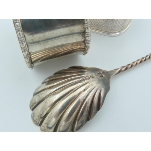 994 - Two Solid Silver Napkin Rings and Solid Silver Spoon with Scallop Motif Decorated Well