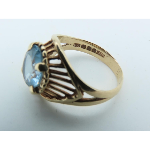 995 - 9 Carat Yellow Gold Mounted Ladies Oval Cut Blue Topaz Dress Ring Size M and a Half