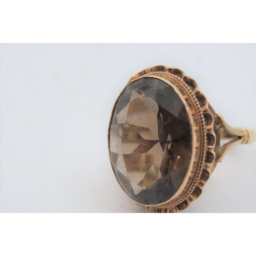 198 - Smokey Quartz Centre Stone Dress Ring Mounted on 9 Carat Gold Ring Size M