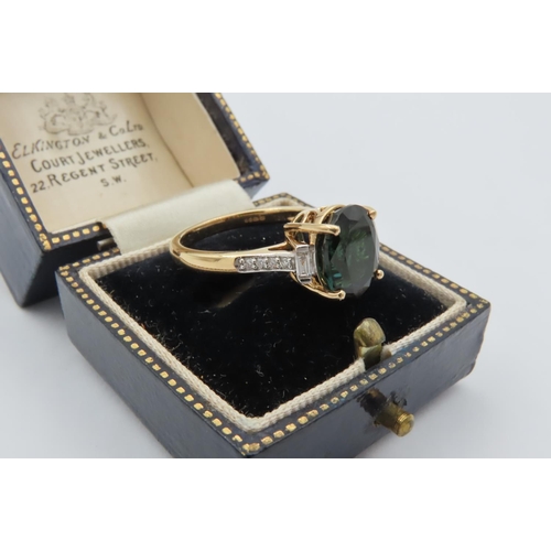 22 - Green Gemstone and Diamond 18 Carat Yellow Gold Mounted Ladies Ring Four Claw Setting with Baguette ... 