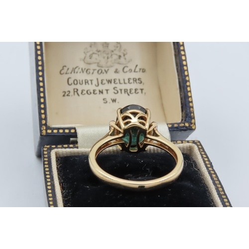 22 - Green Gemstone and Diamond 18 Carat Yellow Gold Mounted Ladies Ring Four Claw Setting with Baguette ... 