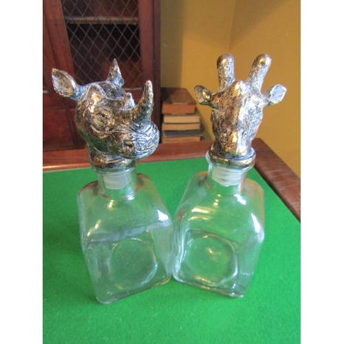 241 - Pair of Novelty Crystal Decanters with Giraffe and Rhinoceros Motif Stoppers Each Approximately 9 In... 