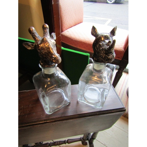 241 - Pair of Novelty Crystal Decanters with Giraffe and Rhinoceros Motif Stoppers Each Approximately 9 In... 