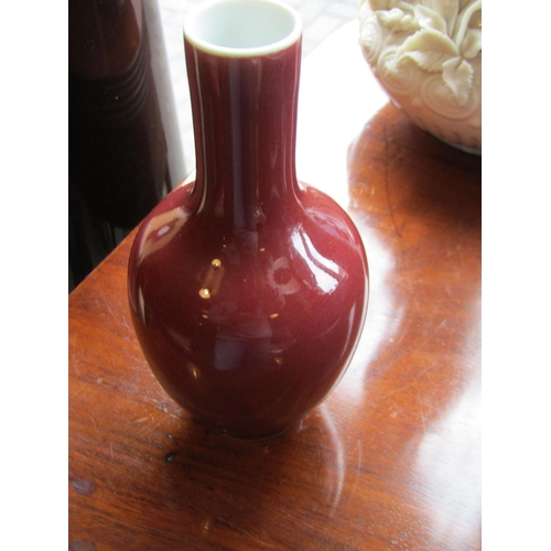 298 - Red Ground Slender Neck Oriental Vase Signed with Characters to Base Approximately 7 Inches High