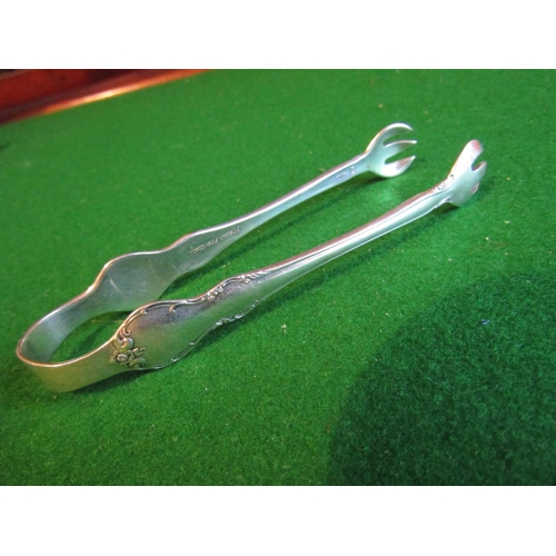 482 - Two Pairs of Solid Silver Sugar Tongs Each Approximately 5 Inches High