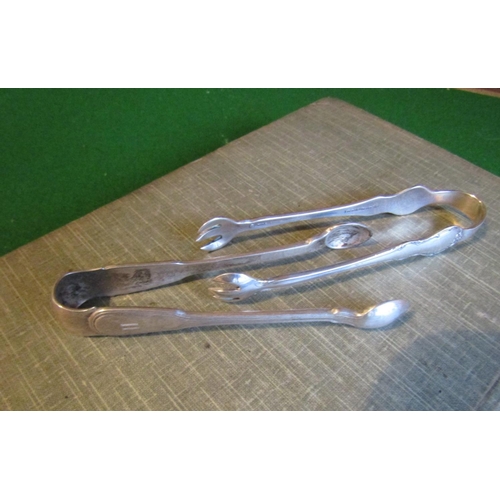 482 - Two Pairs of Solid Silver Sugar Tongs Each Approximately 5 Inches High