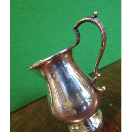497 - Solid Silver Jug with Flying C Scrolled Handle above Pedestal Base Approximately 4 Inches High
