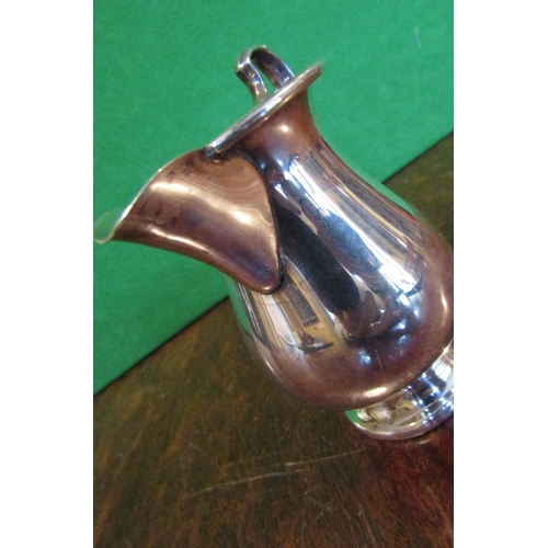497 - Solid Silver Jug with Flying C Scrolled Handle above Pedestal Base Approximately 4 Inches High