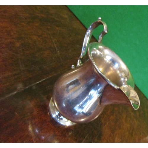 497 - Solid Silver Jug with Flying C Scrolled Handle above Pedestal Base Approximately 4 Inches High