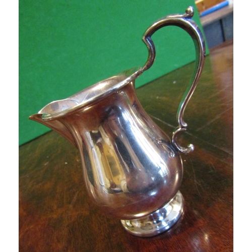 497 - Solid Silver Jug with Flying C Scrolled Handle above Pedestal Base Approximately 4 Inches High