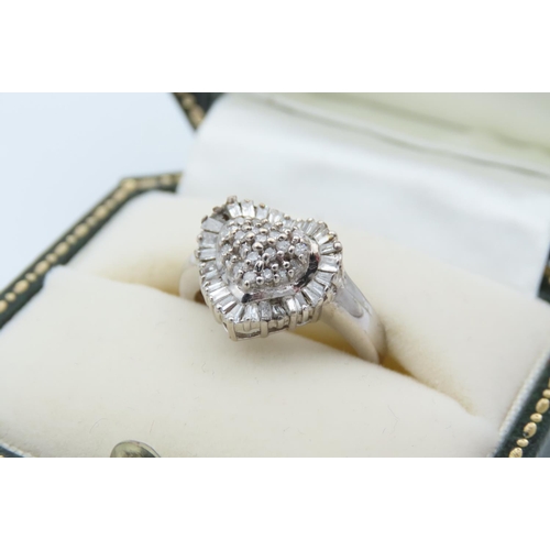 81 - 18 Carat White Gold Set Ladies Diamond Cluster Ring Heart Motif Centre Undulating Baguette Cut Surro... 