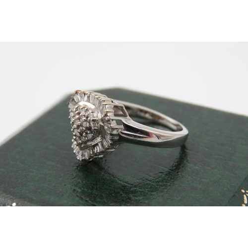 81 - 18 Carat White Gold Set Ladies Diamond Cluster Ring Heart Motif Centre Undulating Baguette Cut Surro... 