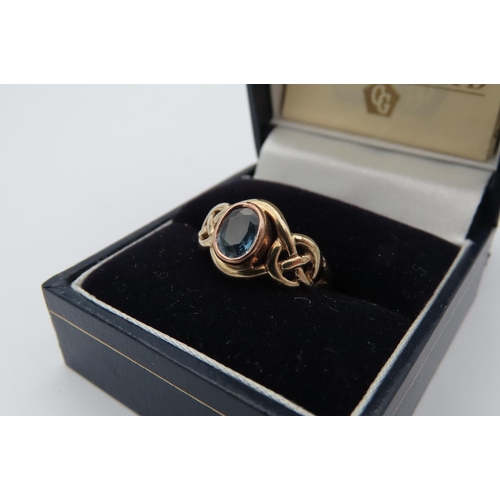 95 - Blue Topaz Ring Mounted on 9 Carat Gold Band with Celtic Intertwining Motifs