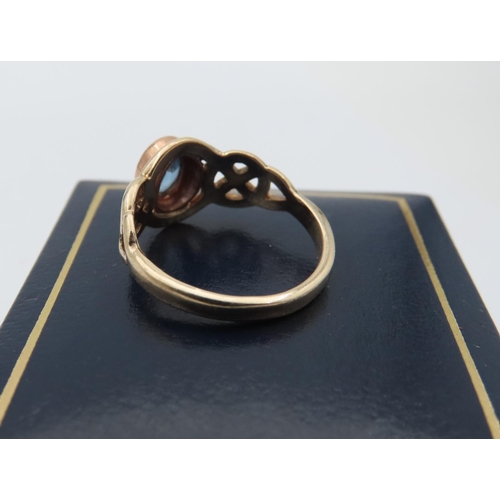 95 - Blue Topaz Ring Mounted on 9 Carat Gold Band with Celtic Intertwining Motifs