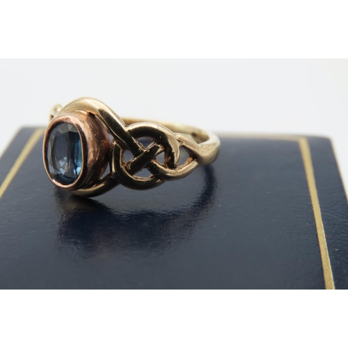 95 - Blue Topaz Ring Mounted on 9 Carat Gold Band with Celtic Intertwining Motifs