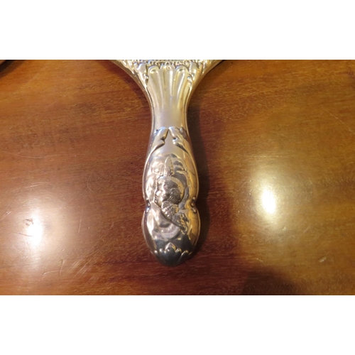 103 - Another Antique Solid Silver Hand Mirror Approximately 10 Inches High Decorated with Various Cherub ... 