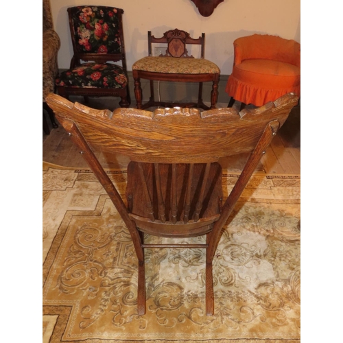 1046 - Antique Rocking Chair with Well Carved Back