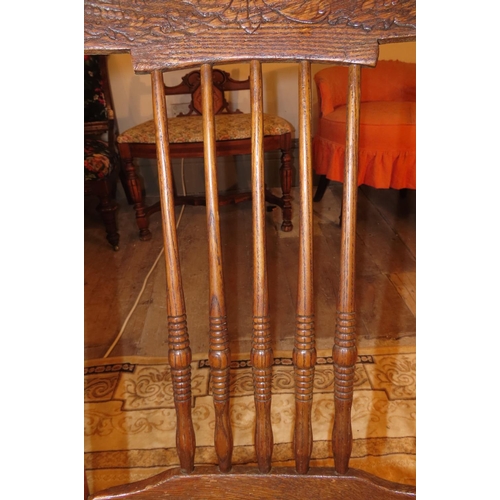 1046 - Antique Rocking Chair with Well Carved Back