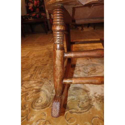 1046 - Antique Rocking Chair with Well Carved Back