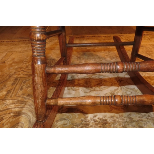 1046 - Antique Rocking Chair with Well Carved Back