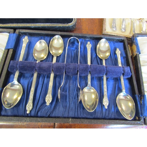 1074 - Four Boxes of Various Antique Silver Plated Flatware Antique including  Teaspoons and Serving Cutler... 