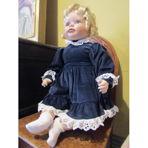 1192 - Porcelain Head Doll Approximately 19 Inches High