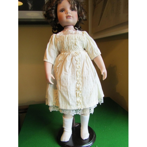 1198 - Porcelain Head Doll Approximately 22 Inches High