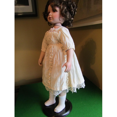 1198 - Porcelain Head Doll Approximately 22 Inches High