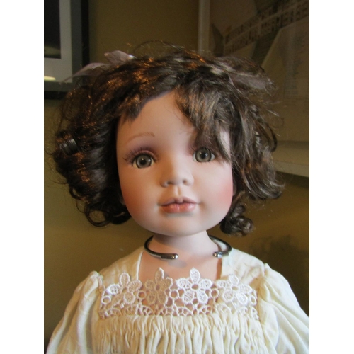 1198 - Porcelain Head Doll Approximately 22 Inches High