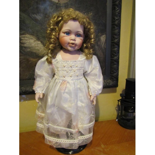 1203 - Porcelain Head Doll Approximately 24 Inches High