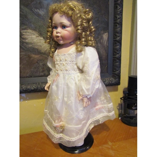 1203 - Porcelain Head Doll Approximately 24 Inches High