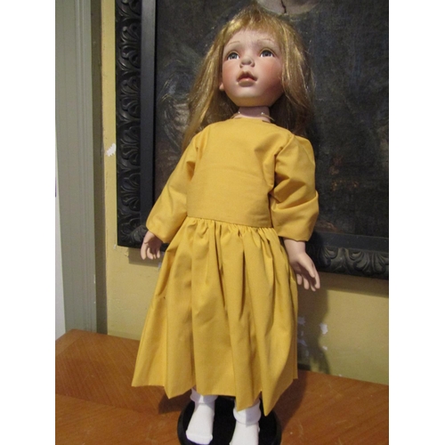 1205 - Porcelain Head Doll Approximately 24 Inches High