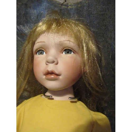 1205 - Porcelain Head Doll Approximately 24 Inches High