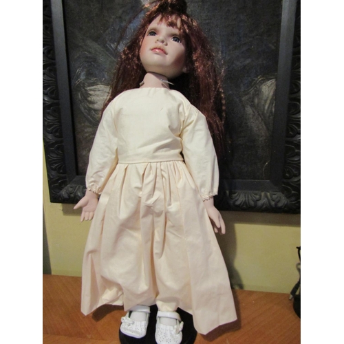 1206 - Porcelain Head Doll Approximately 24 Inches High