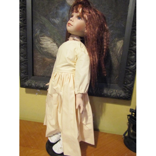 1206 - Porcelain Head Doll Approximately 24 Inches High